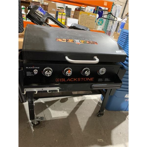 Blackstone Four-Burner Gas Griddle Station With Hood See pictures