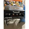 Image 1 : Blackstone Four-Burner Gas Griddle Station With Hood See pictures