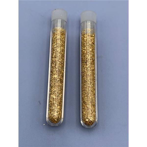 Two Vials Containing Golden Metallic Flakes