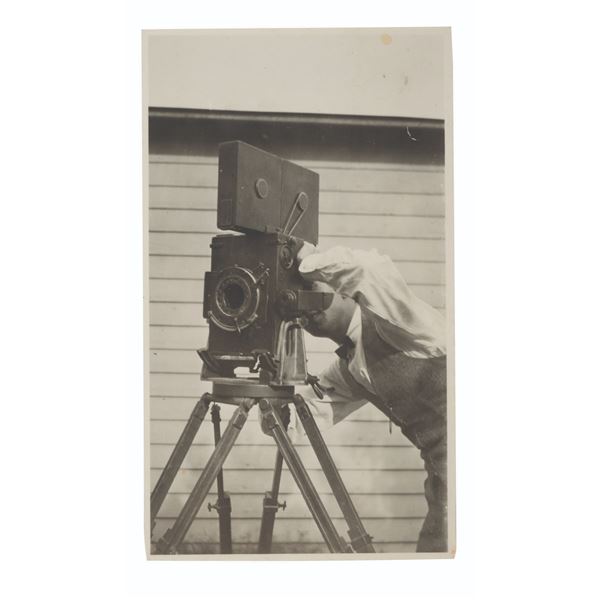 A Photo of Roy Disney with His Camera.