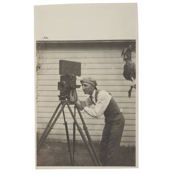 A Photo of Roy Disney with His Camera.