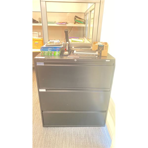 ULINE BLACK 3 DRAWER LATERAL STORAGE CABINET WITH ASSORTED OFFICE CONTENTS