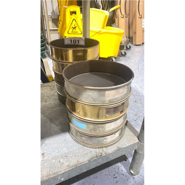 STACK OF COMMERCIAL LABORATORY TEST SIEVES IN ASSORTED SIZES NO 16 - 270