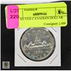 Image 1 : 1959 SILVER CANADIAN DOLLAR