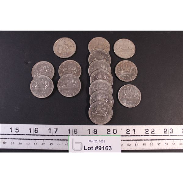Assorted Year Canadian Nickel Dollars (14) and one 1976 Red River Toker Dollar