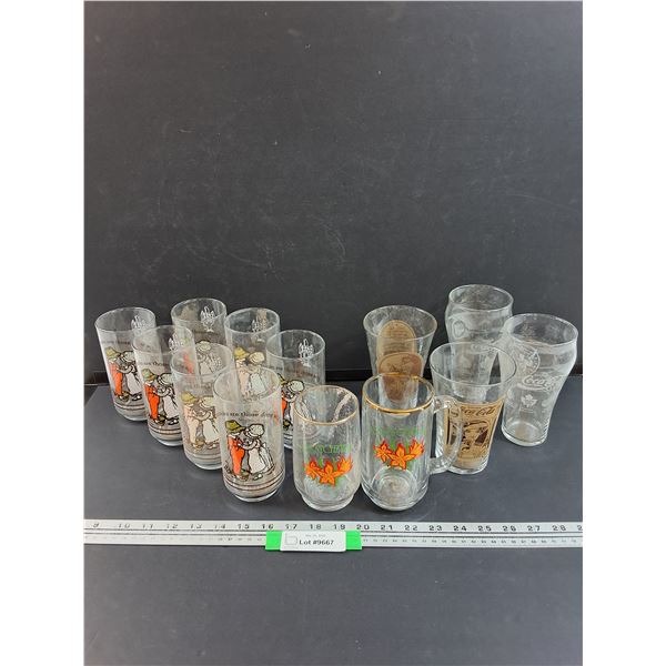 (7) Holly Hobby Glasses, (4) Coca Cola Glasses & (2) Saskatchewan Prairie Lily Glasses