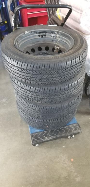 SET OF BRIDGESTONE 175 65 R15 TIRES ON 4 BOLT RIMS