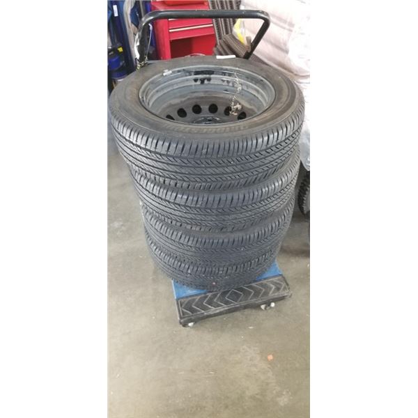 SET OF BRIDGESTONE 175 65 R15 TIRES ON 4 BOLT RIMS