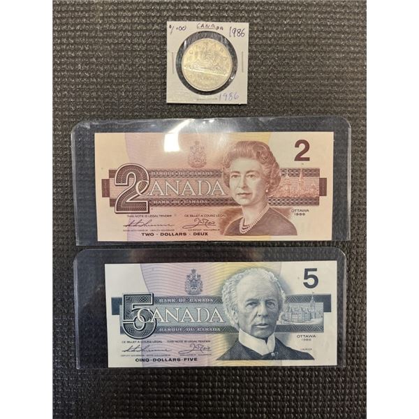 2 1986 CANADIAN BILLS AND COIN, $1 COIN PLUS MINT $2 AND $5 BILL