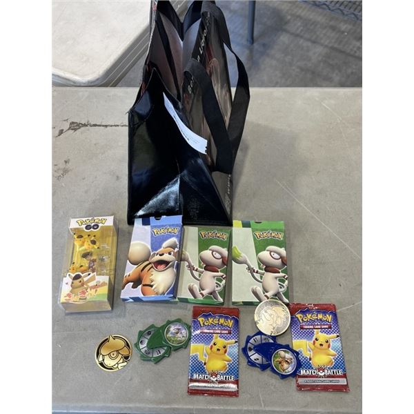 3 BOXES OF POKEMON CARDS, COINS AND NEW EARPHONES