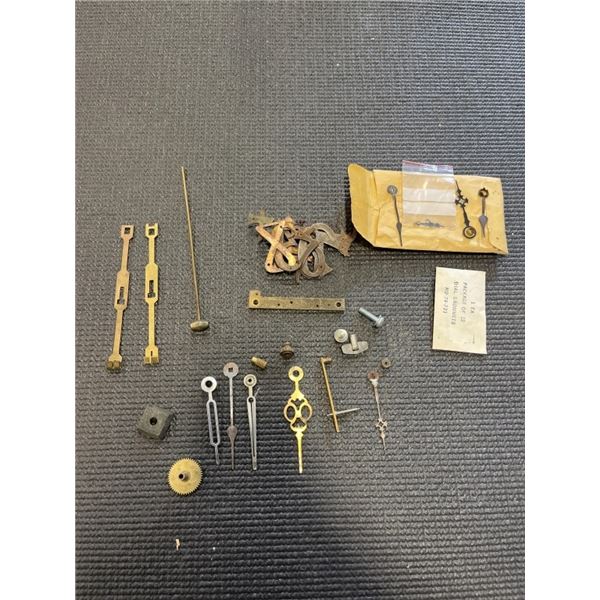 LOT OF ANTIQUE CLOCK PARTS, HANDS, NUMBERS ETC.