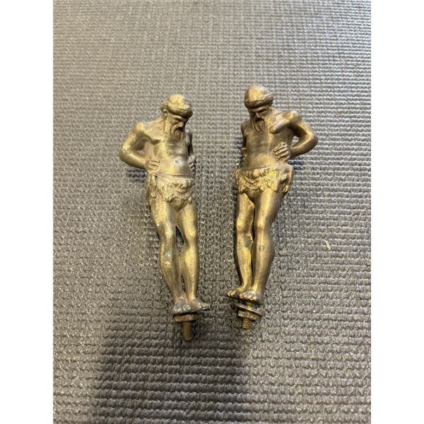 TWO ANTIQUE METAL DECORATIVE CLOCK OR LAMP FIGURES