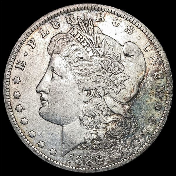 1886-O Morgan Silver Dollar NEARLY UNCIRCULATED