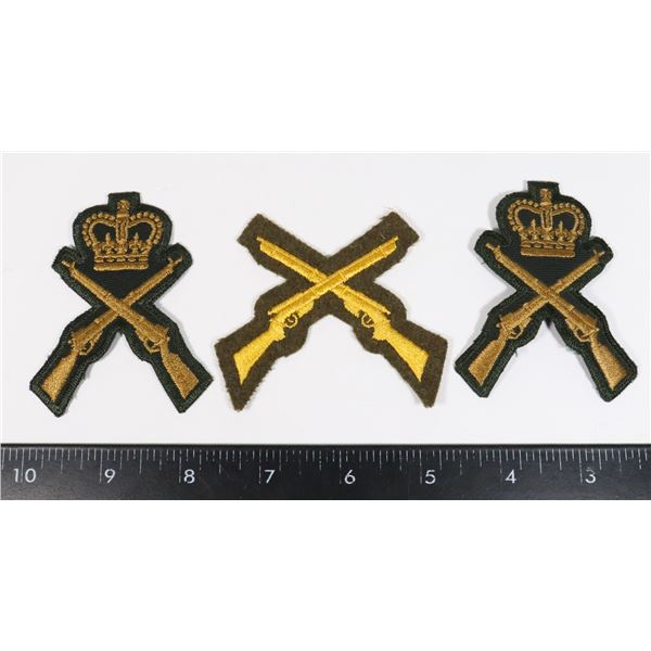 #241 LOT OF THREE CROSSED RIFLE MILITARY INSIGNIA