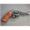 Image 2 : Smith And Wesson Model 19-4 Revolver- .357 Mag- 4.25" Barrel- Checkered Grips- Hard Case- Fair Condi