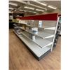 Image 1 : Approx 12' double sided gondola shelving w/extra shelves in back - contents not included)