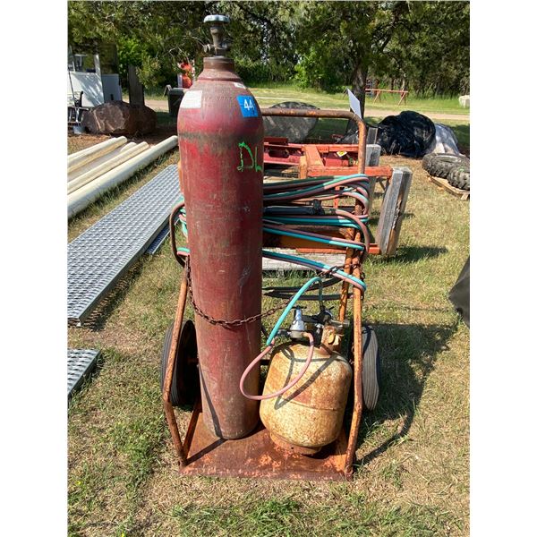 DL Cutting torch, cart and tanks (no contract on tanks) selling as is