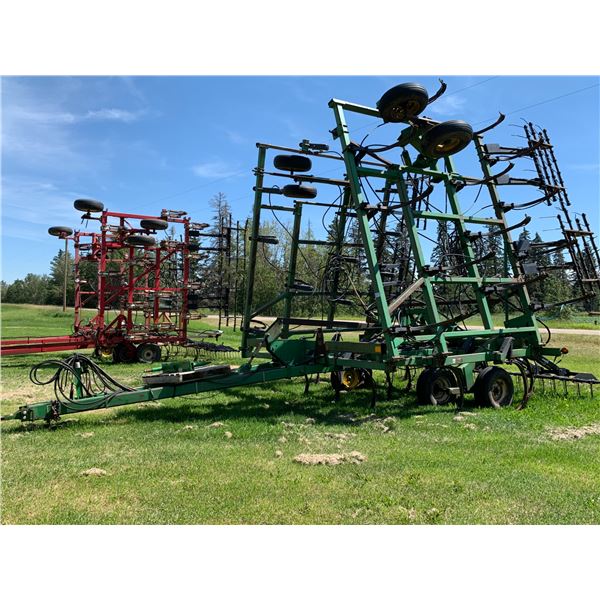 JD HIGH CLEARANCE DEEP TILLAGE CULTIVATOR 41', SN. N00680X000666, 12" spacing, C/W Ezee On 4 bar tin