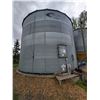 Image 1 : Butler 5-ring grain bin mounted on concrete, 10,000 Bu c/w auger system & motor. Approx. 24 ft dia.,