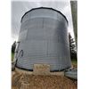 Image 2 : Butler 5-ring grain bin mounted on concrete, 10,000 Bu c/w auger system & motor. Approx. 24 ft dia.,
