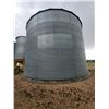 Image 3 : Butler 5-ring grain bin mounted on concrete, 10,000 Bu c/w auger system & motor. Approx. 24 ft dia.,