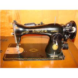 Singer Sewing Machine in Wood Cabinet
