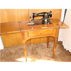 Singer Sewing Machine in Cabinet