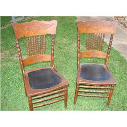 2 Antique pressed back chrs.w/tooled leather seats