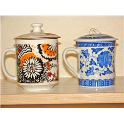 Two China Tea Cups Blue & White, Black & Yellow