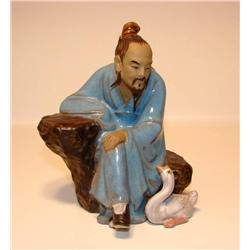 Porcelain Man with Duck