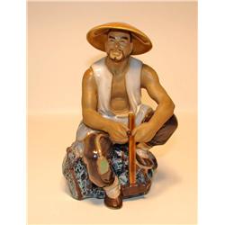 Porcelain Man with Sledge Hammer