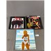 Image 1 : 2 Calendars - 2023 Swimsuit, 1996 (Sealed) The Beatles & LaserDisc "The Nicole Stanton Story: The Ri