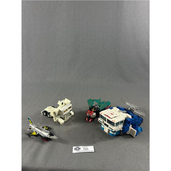 Assortment Of Vintage Transformer Collectible Toys