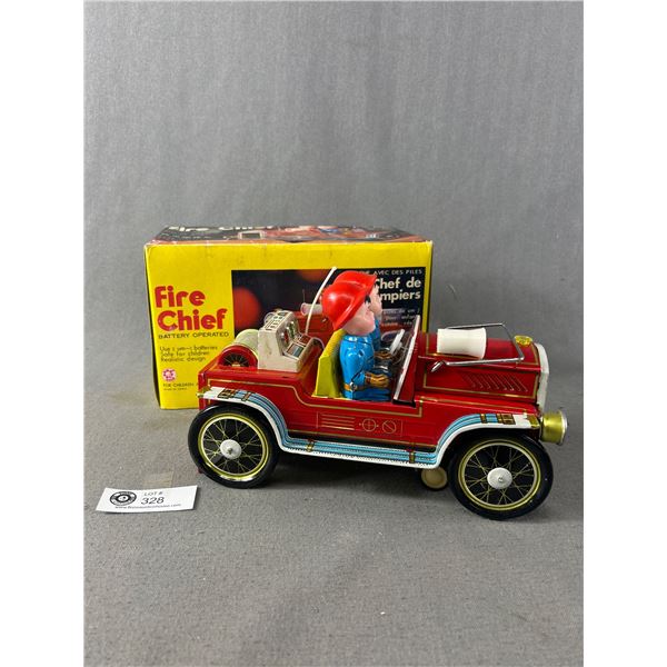 Vintage Battery Operated  Fire Chief  Tin Toy In Original Box. Approx. 9.5 L