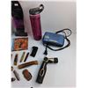 Image 11 : Sennheiser Headphones, Folding Knives, Teeth Whitening Gel, Flute, Water Bottle and Foam Insoles