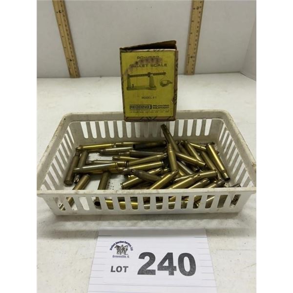 BULLET SCALE AND EMPTY SHELLS