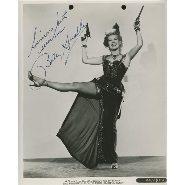 Betty Grable signed movie photo. GFA Authenticated