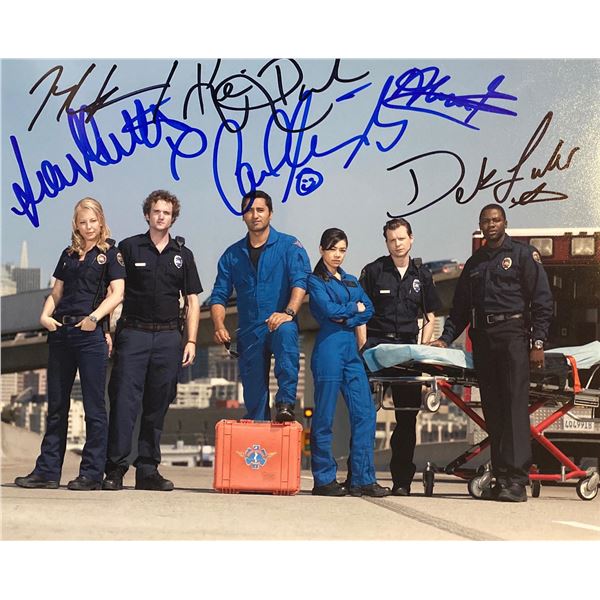 Trauma cast signed photo