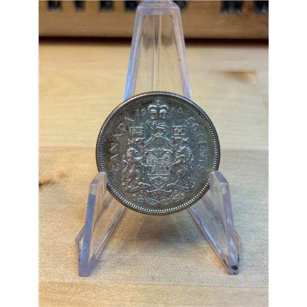 Lot 16-1) 50c Canadian coin 1964