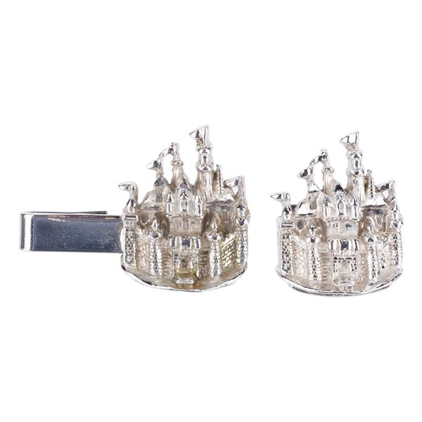 A Sleeping Beauty Castle Silver Cufflink and Tie Clip.