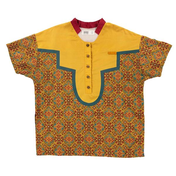 A Walt Disney World Magic Carpets of Aladdin Cast Member Shirt.