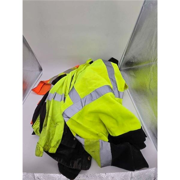 3 high visibility coats and one vest