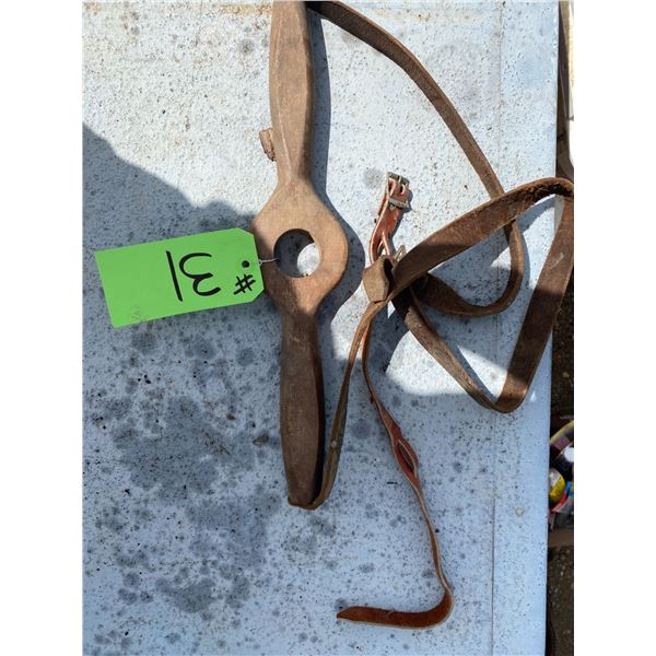 Tiedown handle for a carriage