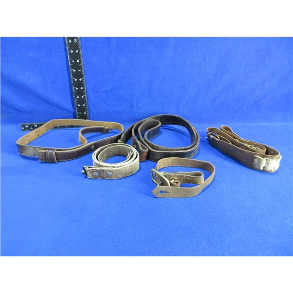 3 Leather Slings, 1 Leather Ammo Belt and a Leather Strap