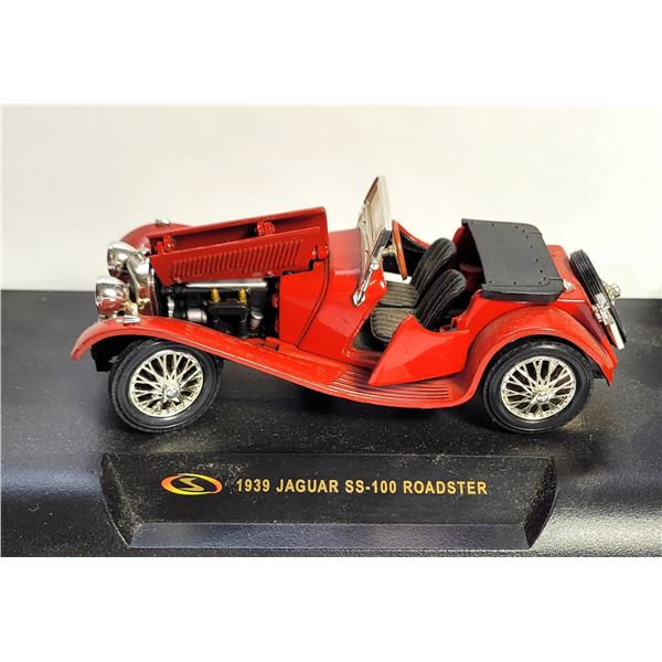 34)  IN ORIGINAL PACKAGING, DIE CAST 1939 JAGUAR
