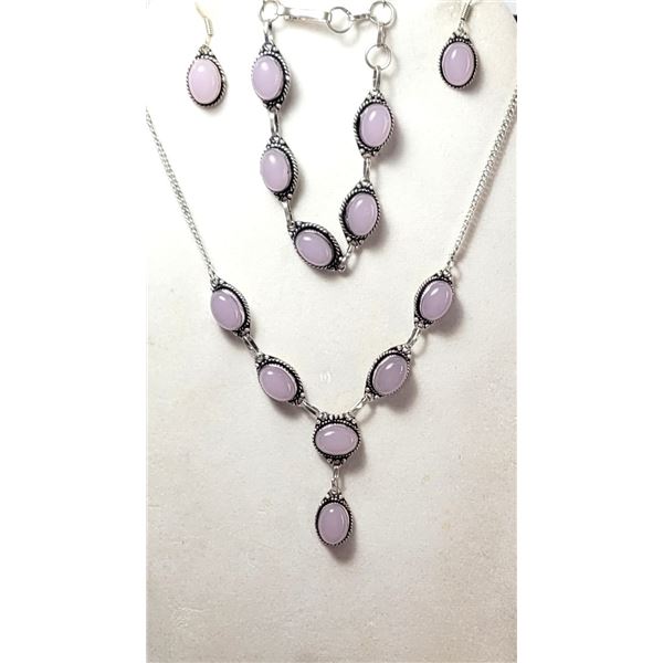 26)  SUITE OF NATURAL OVAL ROSE QUARTZ.  SET