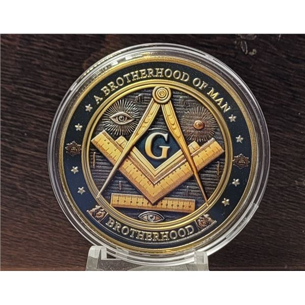 15)  ENCAPSULATED SILVER TONE WITH BLACK, GOLD &