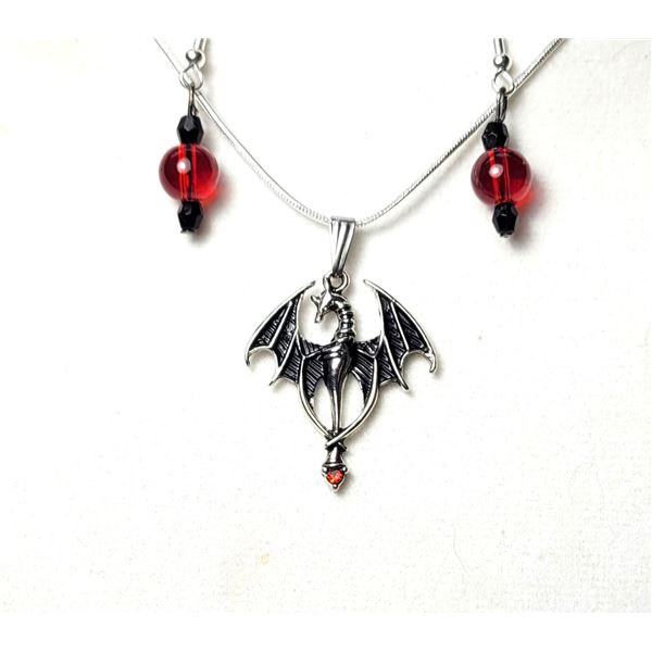 28)  SILVER TONE WITH RED TITANIUM CRYSTAL