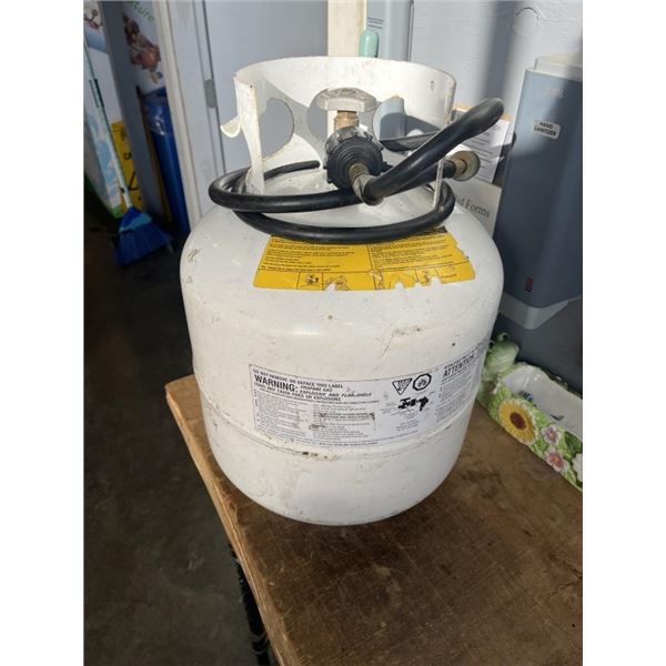 20LB PROPANE TANK WITH HOSE APPROX HALF FULL