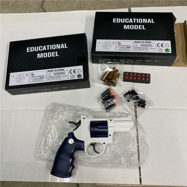 2 NEW SOFT EJECTION EDUCATIONAL REVOLVER GUNS WITH 2 DIFFERENT SETS OF SHELLS
